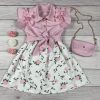Rózsaszín virágmintás kislány ruha fodros ujjakkal, övvel és táskával